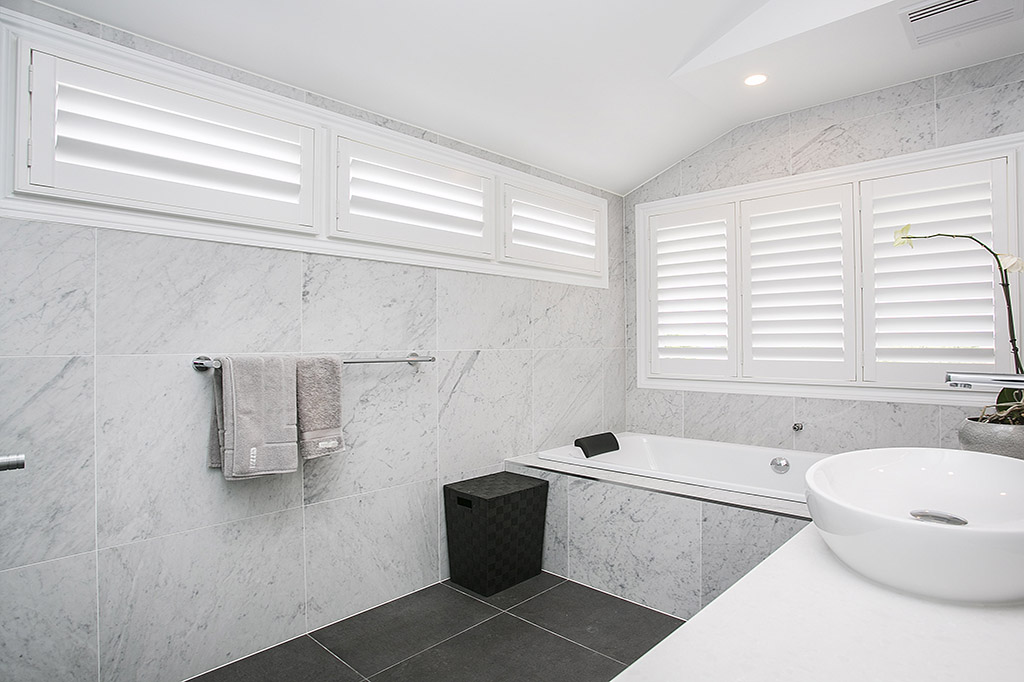 Sylish bathroom with new plantation shutters |Featured image for the Shutters Brisbane Top Level Page on Shutters Blinds & Awnings.